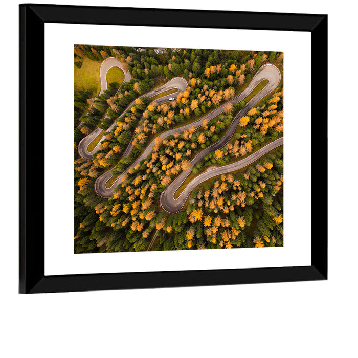 Aerial Curvy Forest Road Wall Art as a framed print