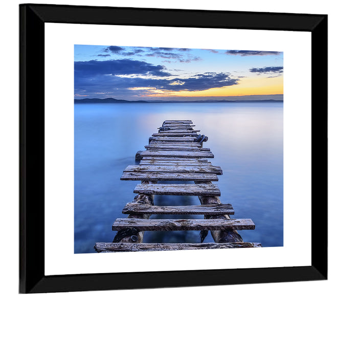Weathered Lake Pier at Dusk Wall Art as a framed print