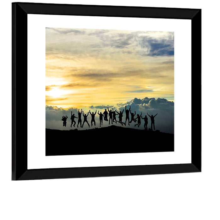 Golden Team Silhouettes at Sunset Wall Art as a framed print