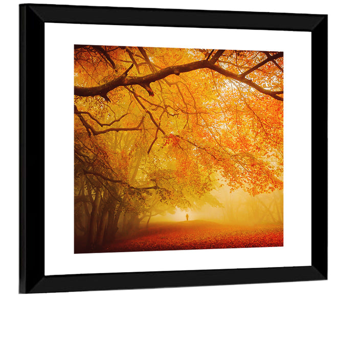 Autumn Forest Path with Lone Figure Wall Art as a framed print