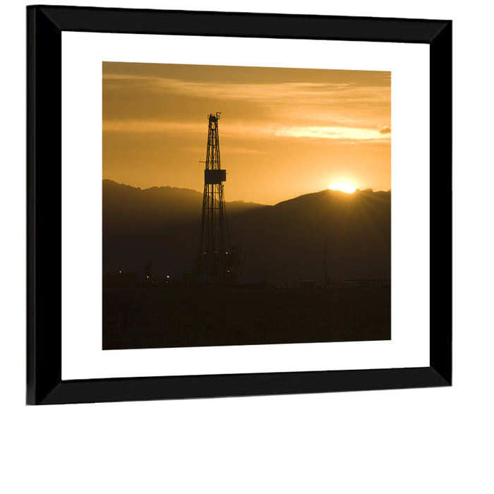 Sunrise Over Drilling Rig Wall Art as a framed print