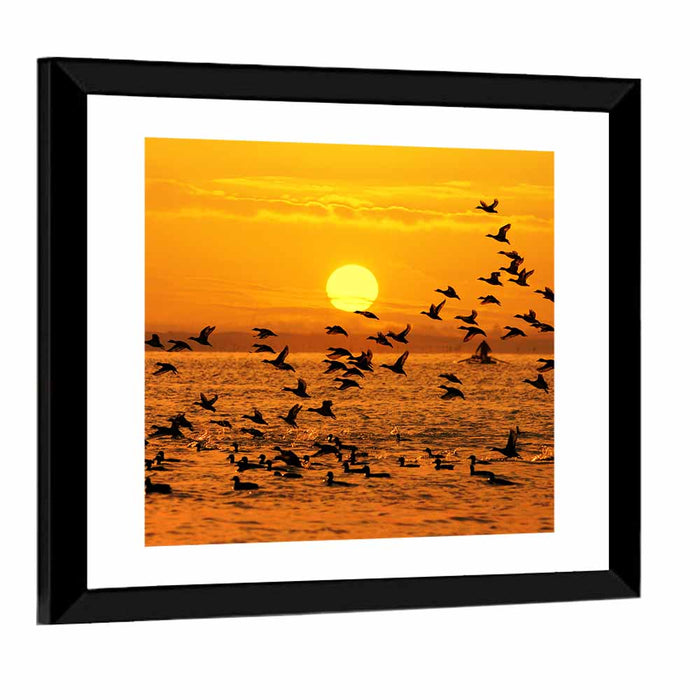 Golden Flock at Sunset Wall Art as a framed print