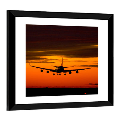 Plane Landing at Sunset Wall Art