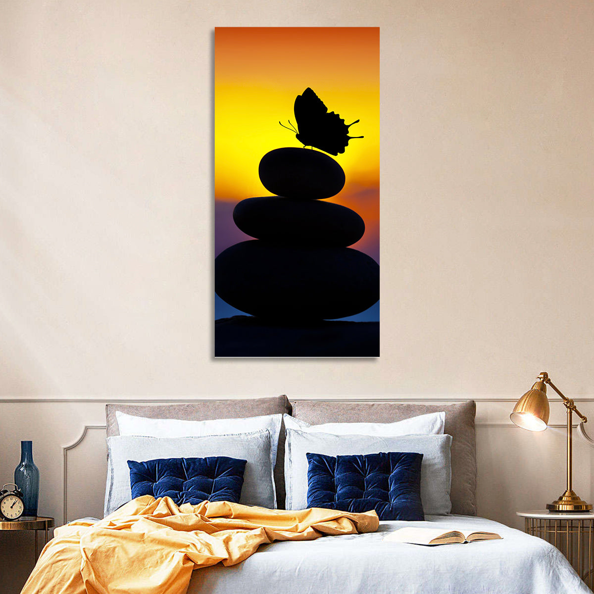 Stacked Spa Stones with Butterfly Wall Art in a room, portrait