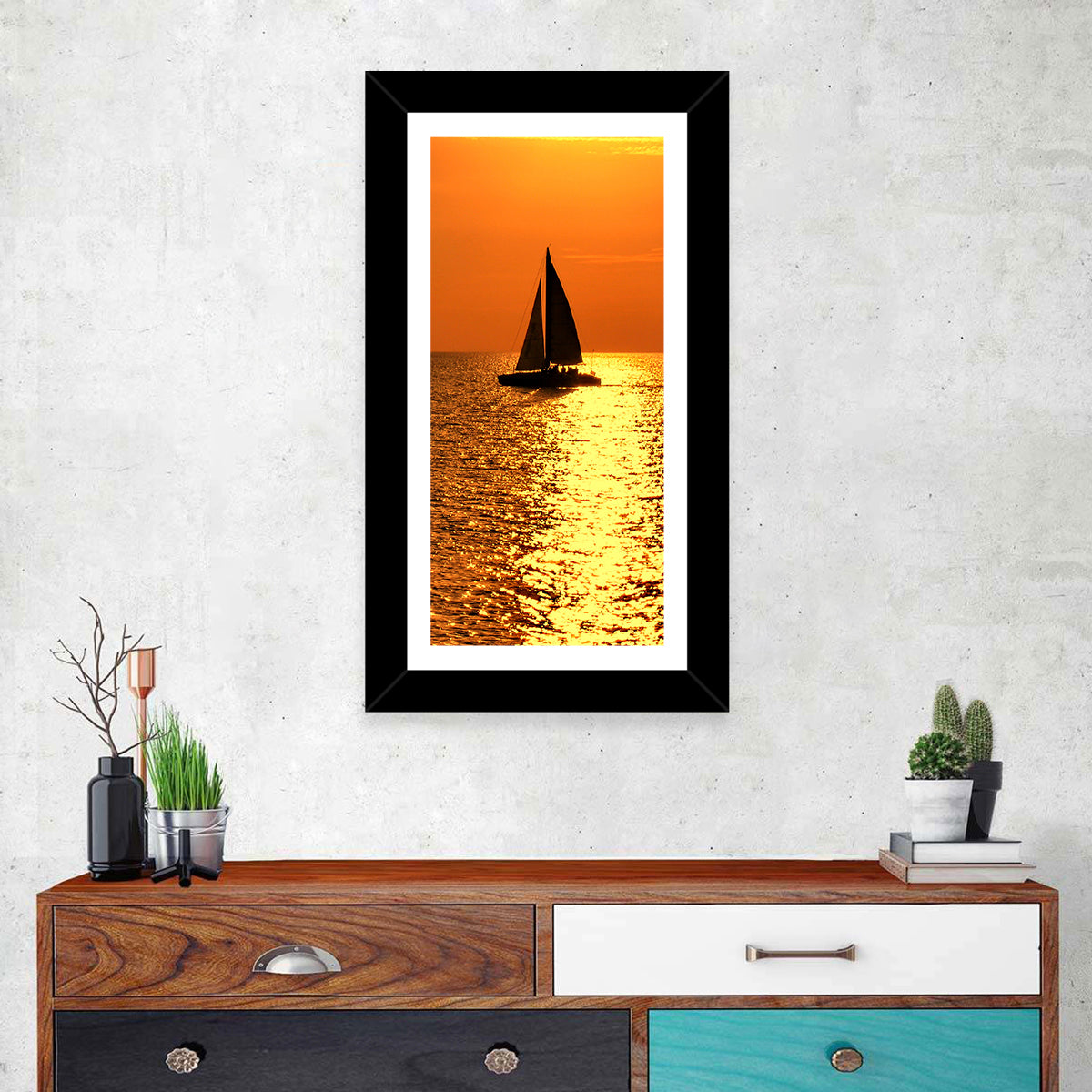 Sailboat Silhouette at Golden Sunset Wall Art in a room, portrait