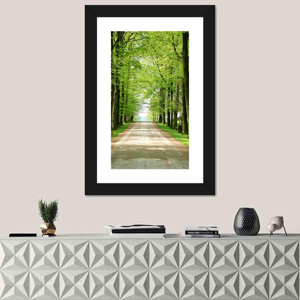 Sunlit Tree-lined Path Wall Art in a room, portrait