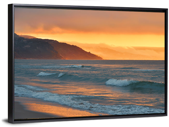 Cliffside Sunset Over Ocean Wall Art as a framed canvas